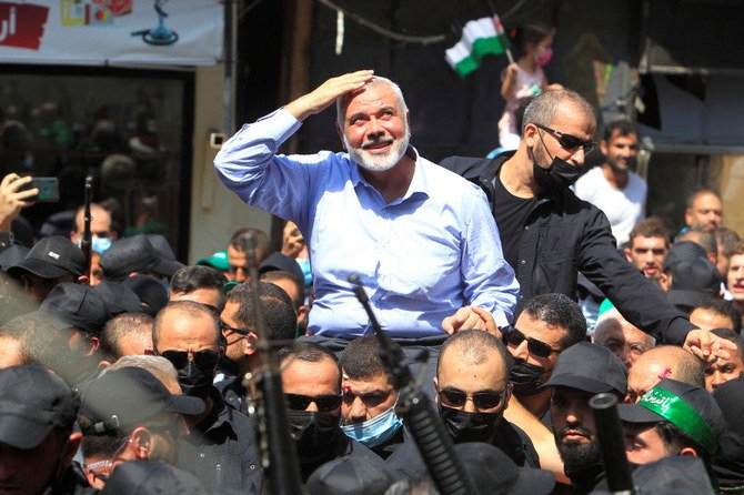 Palestinian group Hamas' top leader Ismail Haniyeh is carried during his visit at Ain el Hilweh Palestinian refugee camp in Sidon, Lebanon, on Sept. 6, 2020. (REUTERS/Aziz Taher)