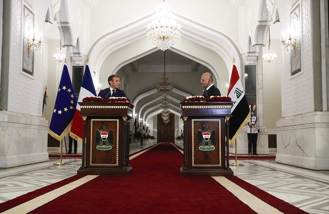 On his final night in Beirut, Macron announced he was heading to Baghdad. (AFP)