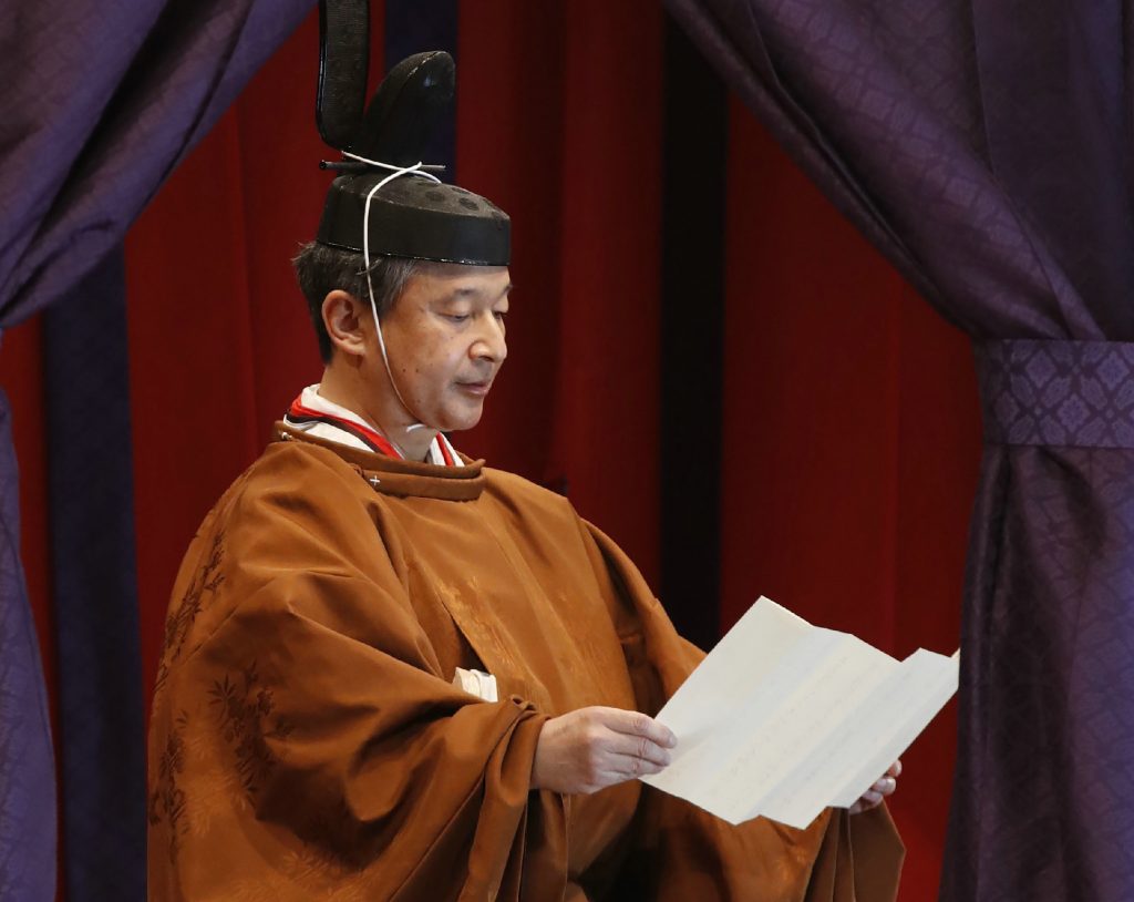 Emperor Naruhito officially proclaims his ascension to the Chrysanthemum throne during an enthronement ceremony at the Imperial Palace in Tokyo on October 22, 2019. (AFP)