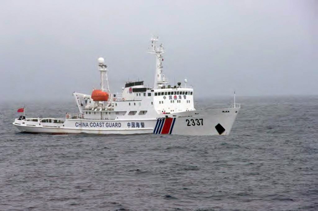 This handout picture taken by the Japan Coast Guard on November 2, 2013 shows a Chinese Coast Guard ship cruising near the disputed islets known as the Senkaku islands in Japan and Diaoyu islands in China. (AFP)