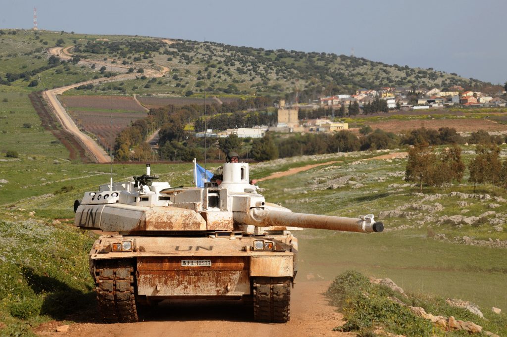 UN peacekeeping force drives his Leclerc tank on the border between Lebanon and Israel in the southern Lebanese village of Yarun, March. 20, 2009.  (AFP)