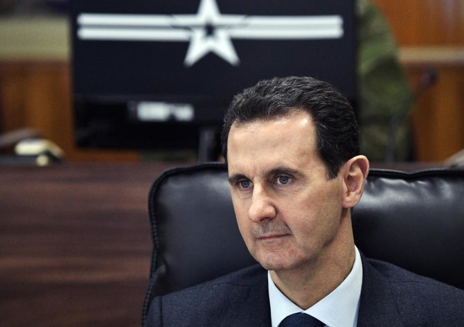 The Trump Administration imposed sanctions Wednesday, Sept. 30, on entities and individuals in Syria as part of Washington's pressure campaign against Assad and his inner circle. (Sputnik/Kremlin Pool Photo/AP/ File Photo)