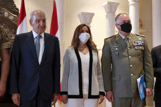 Lebanese parliament speaker Nabih Berri, UNIFIL commander Maj.-Gen. Stefano Del Col and Lebanese outgoing Defense Minister Zeina Akarin Beirut at an event to announce border talks with Israel. (AP Photo / Bilal Hussein)