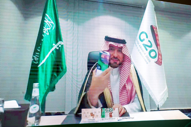 On behalf of Saudi Arabia's King Salman, chair of the Saudi Arabia presidency of the @g20org, Saudi Housing Minister Majid Al Hogail virtually receives the Urban 20 (U20) Communique from U20 Chair Fahd Al Rasheed during the U20 Mayors Summit. (Photo courtesy: @Urban20Riyadh)