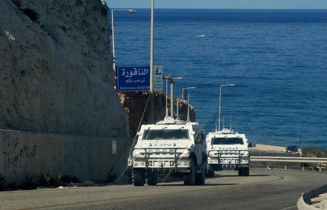 United Nations peacekeeping force (UNIFIL) vehicles patrol the area of Naqura, south of the Lebanese city of Tyre, on the border with Israel, on October 2, 2020. (AFP)