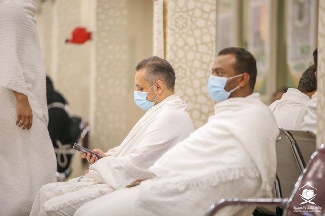 The first group of pilgrims are checked for signs of coronavirus as they arrive in Jeddah on Saturday, before proceeding to Makkah. (Supplied)