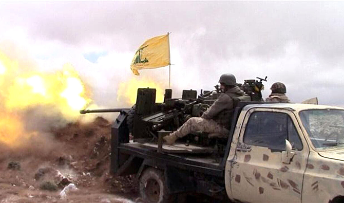 Hezbollah has been strengthening their positions near the northeastern Lebanese town of Ras Baalbek with rockets and heavy artillery. (AFP/File)