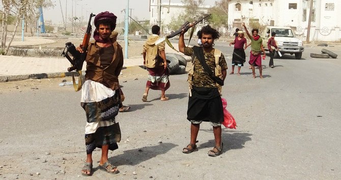 Forces loyal to the internationally recognized government have been engaged in heavy fighting with Houthi insurgents since Friday, violating the truce agreed under the Stockholm Agreement. (AFP/File)