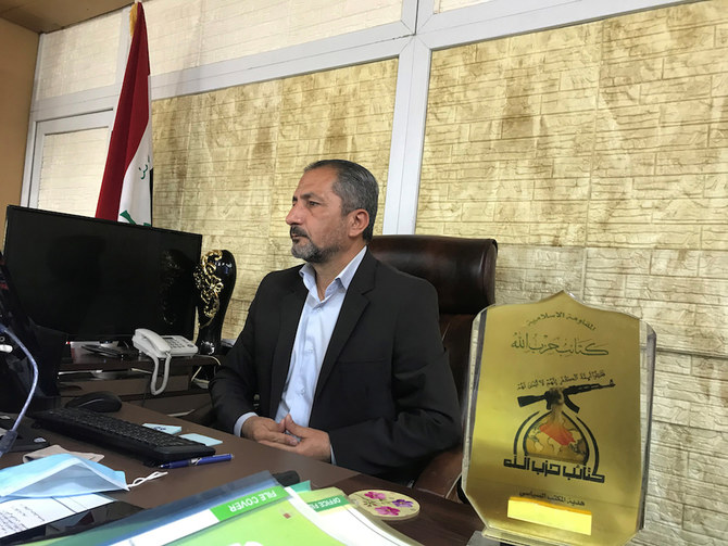 Mohammed Mohi, spokesman for Kataib Hezbollah paramilitary group attends an interview with Reuters in Baghdad, Iraq Oct. 11, 2020. (Reuters)