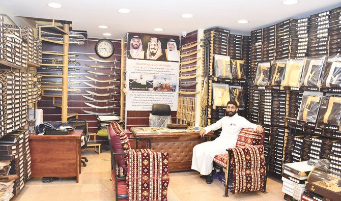 Abdullah Jafar Al Qattan, inside his bisht shop in Al Ahsa's traditional Al-Qaisariyah Souk. (AN Photo/Mokhtar Bumouzah)