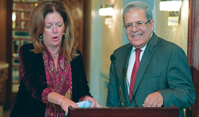 Tunisia’s Foreign Minister Othman Jerandi and Stephanie Williams, the deputy special representative of the UN Secretary-General for Political Affairs in Libya, hold a press conference at Carthage Palace on the eastern outskirts Tunis on Monday. (AFP)