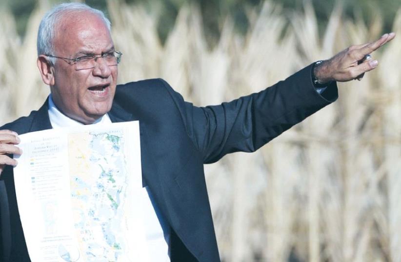 Saeb Erekat speaks to reporters about Israeli appropriation of West Bank land, Jericho, 2019. (Reuters)