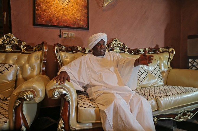Sudanese businessman Abu al-Qassem Bortoum speaks during an interview with AFP, at his mansion in the Sudanese capital Khartoum on October 13, 2020. (AFP)