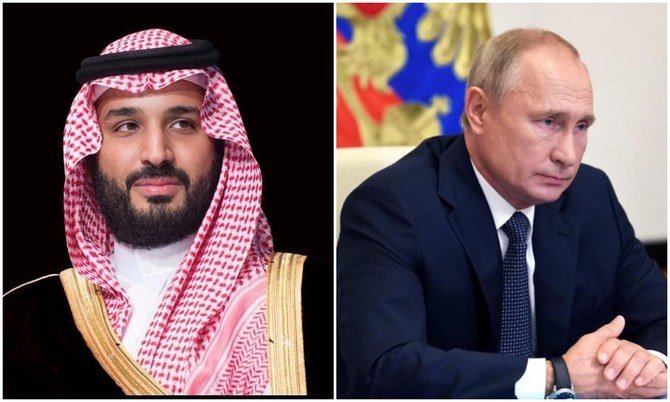 Saudi Arabia's Crown Prince Mohammed bin Salman discussed with Russian President Vladimir Putin energy markets and the implementation of agreements by the oil producers group known as OPEC+ on Saturday. (SPA/AFP File Photo)