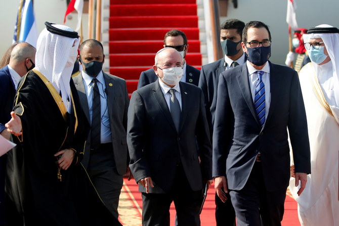 Israeli National Security Adviser Meir Ben-Shabbat and U.S. Treasury Secretary Steve Mnuchin arrive in Muharraq, Bahrain, October 18, 2020. (Reuters)