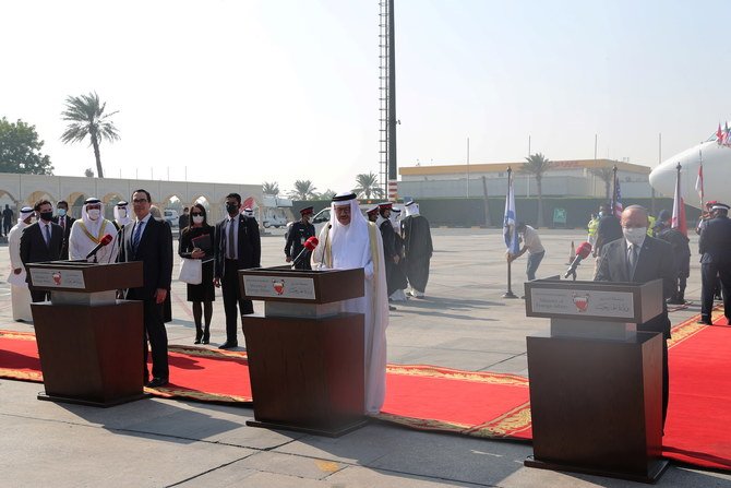 Israeli National Security Adviser Meir Ben-Shabbat, US Treasury Secretary Steve Mnuchin, and Bahrain's Foreign Minister Abdullatif Al Zayani, deliver statements upon the Israeli delegation's arrival in Muharraq, Bahrain October 18, 2020. (Reuters)