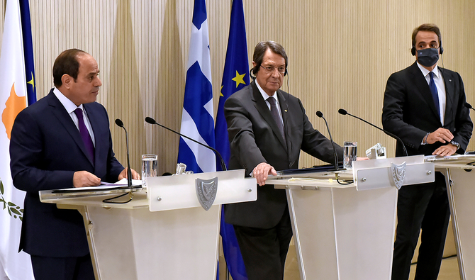 Cypriot President Nicos Anastasiades, Greek Prime Minister Kyriacos Mitsotakis and Egyptian President Abdel Fattah El-Sisi are seen during a news conference after a trilateral summit between Greece, Cyprus and Egypt, at the Presidential Palace in Nicosia, Cyprus October 21, 2020. (Reuters)