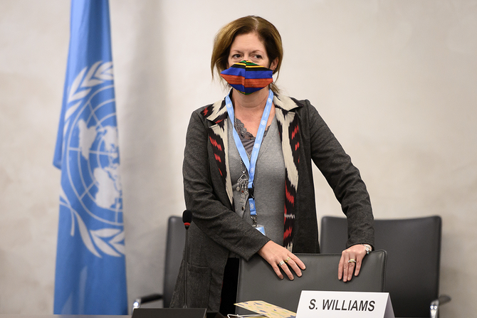 Deputy Special Representative of the UN Secretary-General for Political Affairs in Libya Stephanie Williams wearing a face mask attends the talks between the rival factions in the Libya conflict at the United Nations offices in Geneva, Switzerland October 20, 2020. (Reuters)
