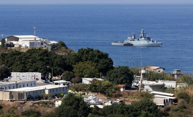 Above, a UN ship in the southernmost area of Naqura, by the border with Israel. Lebanon and Israel began unprecedented talks to settle a maritime border dispute and clear the way for oil and gas exploration. (AFP file photo)