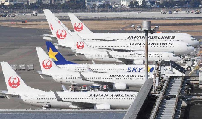 Japan Airlines (JAL) passenger jets sit parked at Haneda International Airport in Tokyo on January 31, 2018. (AFP)