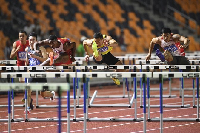 Athletes perform at the 2018 Asian Games in Jakarta. Saudi Arabia hopes to host the games in 2030 in Riyadh. (AFP/File)