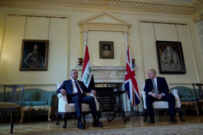 Al-Khadimi met the UK leader at Downing Street as part of a European tour. (@IraqiPMO)