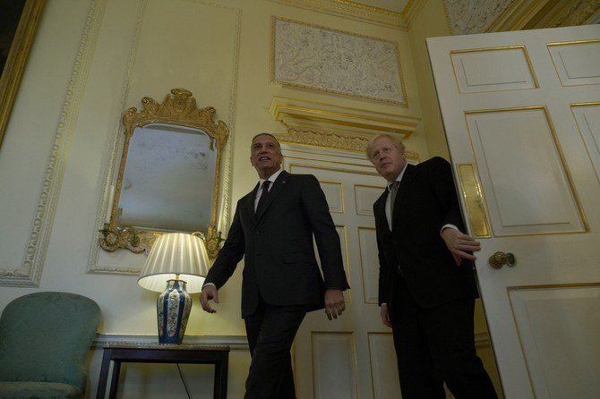 Al-Khadimi met the UK leader at Downing Street as part of a European tour. (@IraqiPMO)
