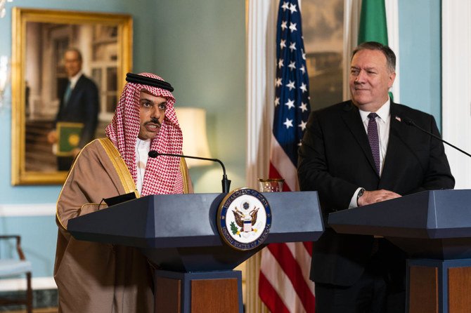 Secretary of State Mike Pompeo (right) listens to Saudi Foreign Minister Prince Faisal bin Farhan speak during their meeting at the State Department, Wednesday, Oct. 14, 2020, in Washington. (AP)