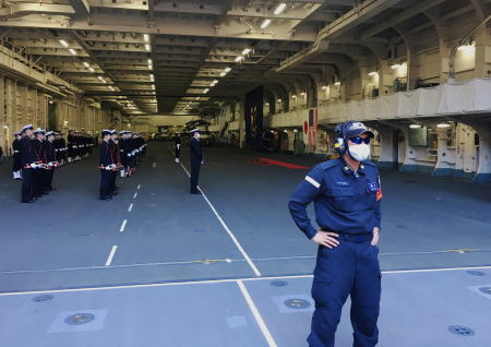 Japan Maritime Self-Defense Force soldiers wearing protective masks are seen on board of the helicopter destroyer JS Kaga during Keen Sword, amid the coronavirus disease (COVID-19) outbreak, at mid-sea off south of Japan, October 26, 2020. (Reuters)