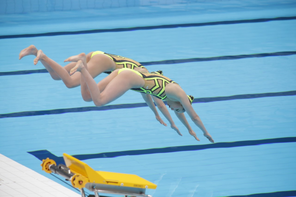 Megumu Yoshida and Yokiko Yoshida, artistic swimmers, performed a robot dance at the ceremony. (Arab News Japan)