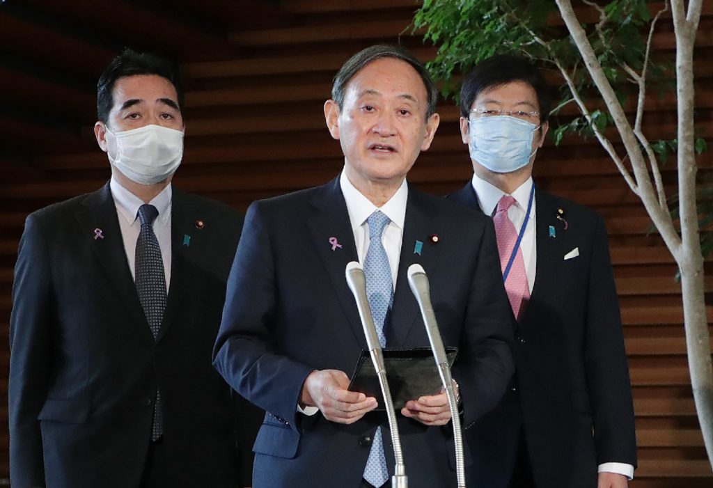 Japan's Prime Minister Yoshihide Suga speaks to the reporters after his telephone talk with US President-elect Joe Biden, at the prime minister's official residence in Tokyo, Nov. 12, 2020. (AFP)