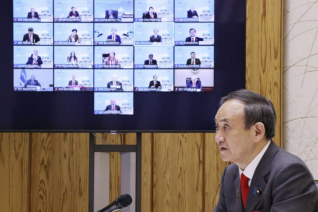 In this handout photograph received by Jiji Press and released by Japan's Cabinet Public Relations Office, Japan's Prime Minister Yoshihide Suga speaks from Tokyo during the online Asia-Pacific Economic Cooperation (APEC) leaders' summit being held in Kuala Lumpur. (AFP)