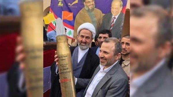 Lebanese Foreign Minister Gebran Bassil is shown receiving a “missile gift” from the Hezbollah in this picture posted on www.lebanonfiles.com. (Courtesy: www.lebanonfiles.com)