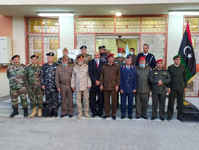 Members of Libyan joint military commission pose for a group picture in Ghadames, 465 kilometers southwest of the capital Tripoli, on Nov. 3, 2020. (AFP)