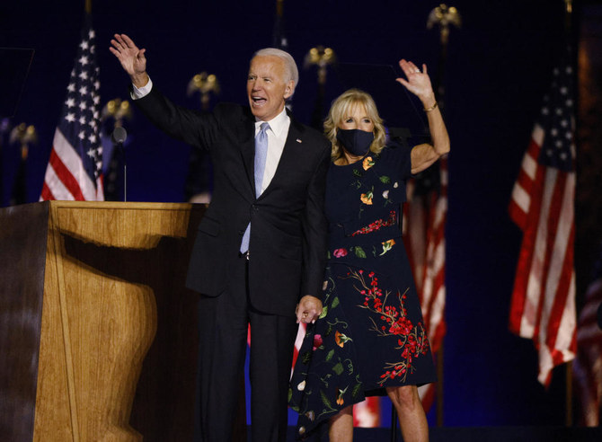 Democratic 2020 U.S. presidential nominee Joe Biden and his wife Jill wave to the crowd after speaking at his election rally, after the news media announced that Biden has won the 2020 U.S. presidential election over President Donald Trump, in Wilmington, Delaware, U.S., November 7, 2020. REUTERS/Jim Bourg