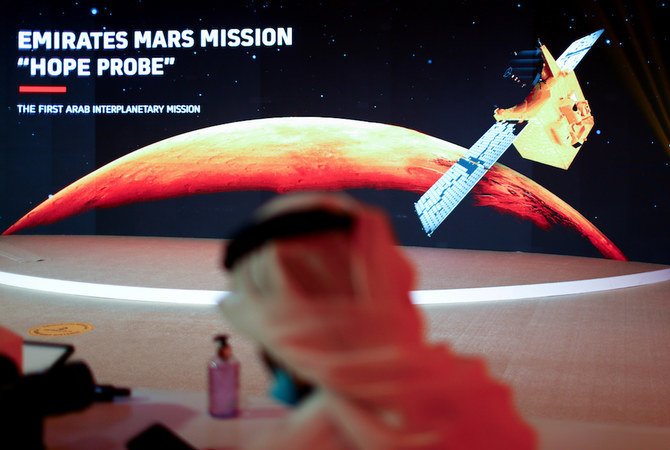 A representation of Mars and the Hope Probe is seen at the Mohammed bin Rashid Space Centre ahead of its launch from Tanegashima Island in Japan. (Reuters)