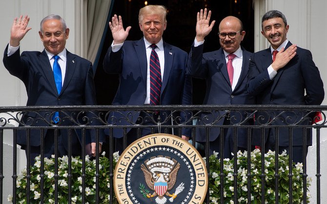 (L-R)Israeli Prime Minister Benjamin Netanyahu, US President Donald Trump, Bahrain Foreign Minister Abdullatif al-Zayani, and UAE Foreign Minister Abdullah bin Zayed Al-Nahyan wave from the Truman Balcony at the White House after they participated in the signing of the Abraham Accords where the countries of Bahrain and the United Arab Emirates recognize Israel, in Washington, DC, September 15, 2020. (AFP/File Photo)