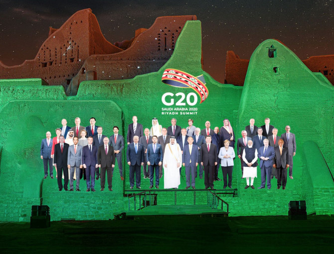 A virtual ‘family photo’ of G20 heads of state was displayed on Friday on the walls of the historic Salwa Palace in Diriyah at a cultural dinner for journalists, guests and envoys. Individual photos of the G20 leaders were joined together with King Salman at the center. The ‘family photo’ is an annual tradition that highlights member states’ commitment to work together via a series of agreements signed by the leaders. The dinner was hosted by the G20 Saudi Secretariat. (Supplied)