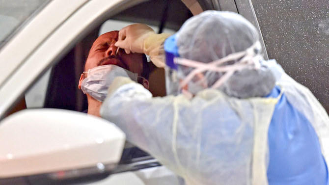 The Saudi Health Ministry has urged people to continue following precautions to keep the virus at bay. (AFP)