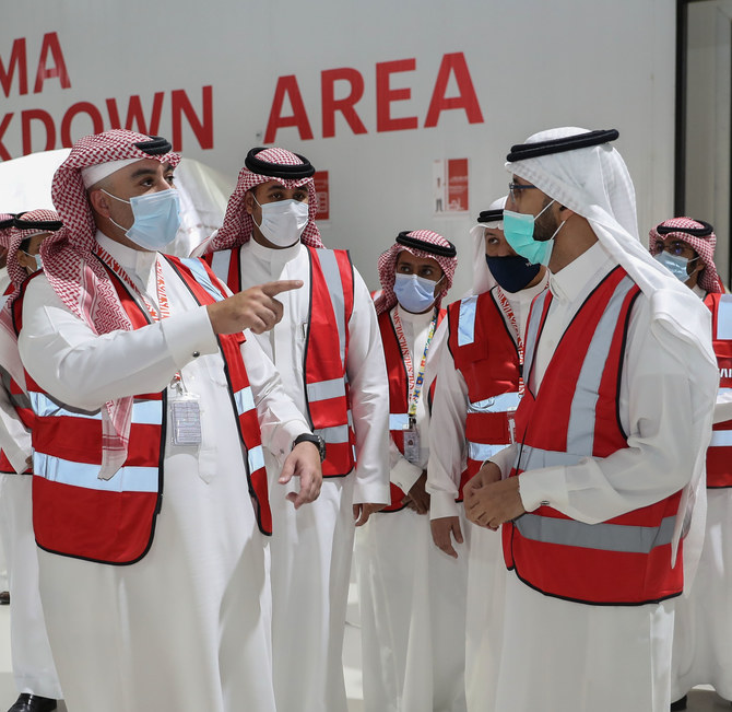 Al-Jasser, and Dr. Hisham Al-Jadhey, CEO of the Saudi Food and Drug Authority (SFDA) taking a tour of the SAL facility. (AN photo by Yazeed Alsamrani)