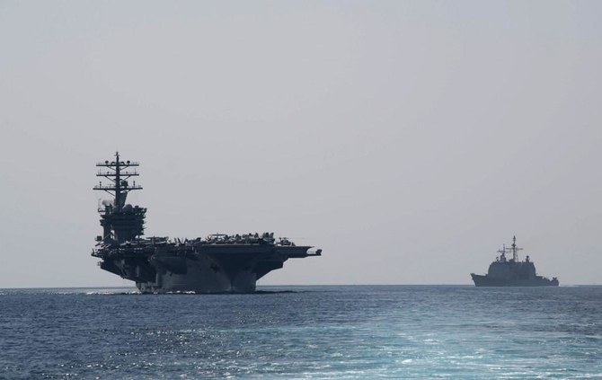 A US aircraft carrier group has moved back into the Gulf region, but a spokeswoman said its return was not triggered by any “threats” after the killing in Iran of a top nuclear scientist. (File/AFP)