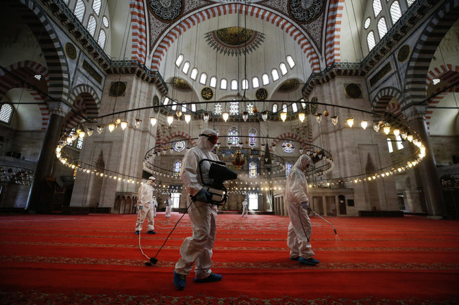 Municipality workers disinfect the grounds of the historical Suleymaniye Mosque, in Istanbul. (File/AP)