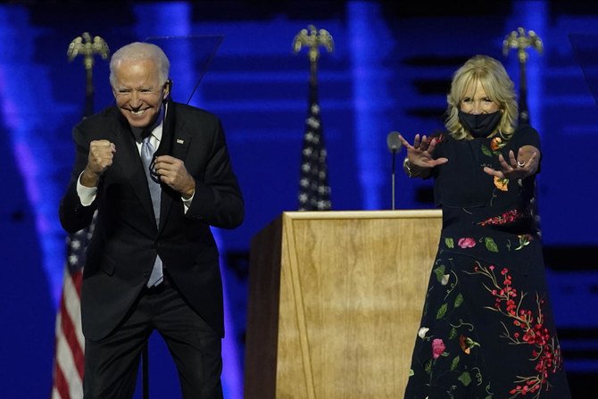 President-elect Joe Biden and wife Jill Biden gesture to supporters Saturday, Nov. 7, 2020, in Wilmington, Del. (AP)