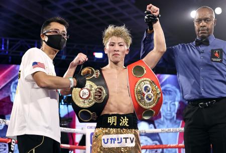 Japanese boxer Naoya Inoue celebrates defeating Australian boxer Jason Moloney (not pictured) in their bantamweight title bout at MGM Grand Conference Center on October 31, 2020 in Las Vegas, Nevada. (AFP)