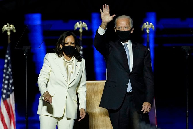 US President-elect Joe Biden and Vice President-elect Kamala Harris deliver remarks in Wilmington, Delaware, on November 7, 2020, after being declared the winners of the presidential election. (AFP)