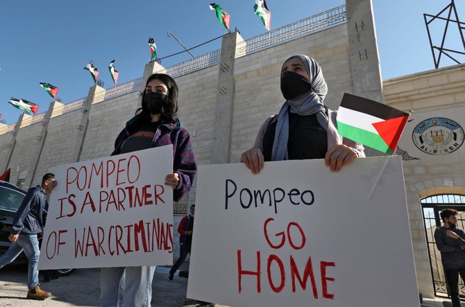 Palestinians demonstrate near the Israeli settlement of Psagot, built on the lands of the city of al-Bireh, against the visit by US Secretary of State to the settlement, on November 18, 2020 in the occupied West Bank. (AFP)