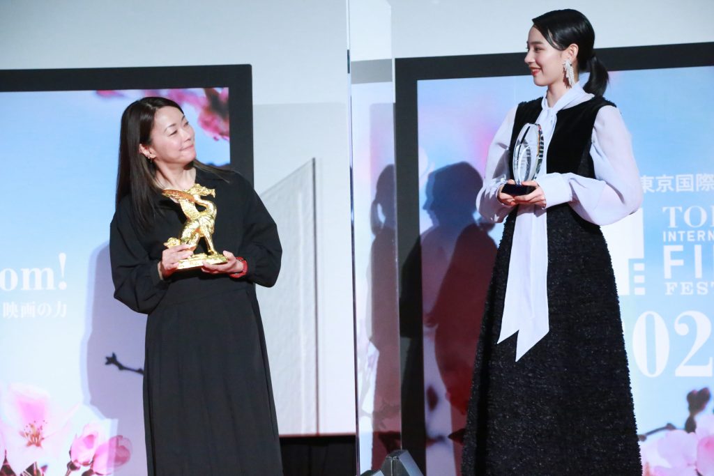 Movie director Akiko Okhu and main actress Ms Non after receiving the audience award. (ANJ photo)