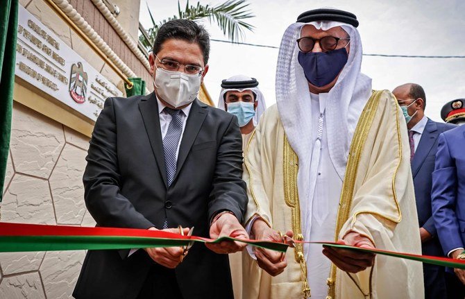Moroccan Foreign Minister Nasser Bourita (left) and the UAE’ ambassador in Morocco, Al-Asri Saeed Ahmed Aldhaheri (right), inaugurate UAE's consulate in Laayoun, the main city in Morocco's disputed region of Western Sahara on November 4, 2020. (AFP)