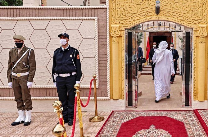 Security guards stand outside the UAE’s new consulate in Laayoun. (AFP)