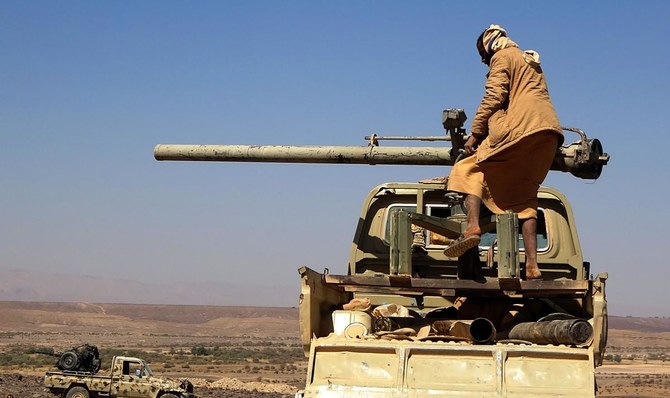 A combatant mans a recoilless gun as forces loyal to Yemen's Saudi-backed government clash with Houthi rebel fighters around the strategic government-held 